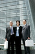 Businessmen and woman standing in a row. 