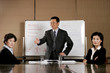 Women showing their dissatisfaction towards their manager's presentation. 
