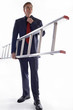Photo: Man in business suit holding a ladder. Man in business suit holding a ladder.