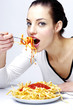 Woman eating pasta.
