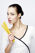 Woman holding dry spaghetti.
