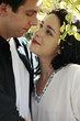 Photo: Couple looking adoringly at each other. Couple looking adoringly at each other.
