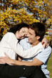 Photo: Loving couple in the park. Loving couple in the park.
