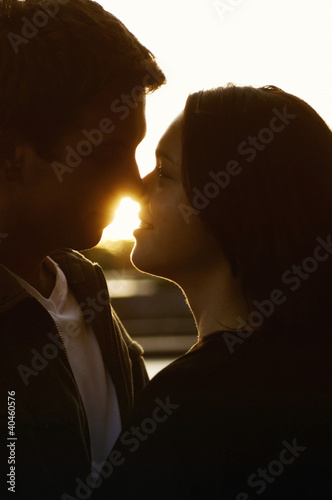 Photo: Couple about to kiss. Couple about to kiss.