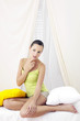 Woman posing on the bed.
