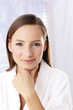 Woman smiling at the camera.