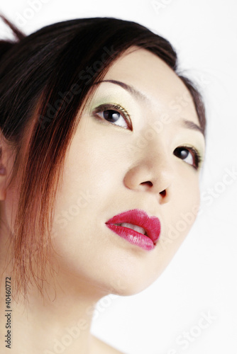 Foto: Portrait of a woman with makeup. Portrait of a woman with makeup.