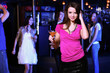 Photo: Young woman having fun at nightclub disco Young woman having fun at nightclub disco
