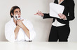 Businessman shaving his beard in the office.