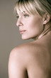 Photo: Back shot of a topless woman. Back shot of a topless woman.