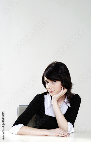 Photo: Businesswoman posing for the camera. Businesswoman posing for the camera.