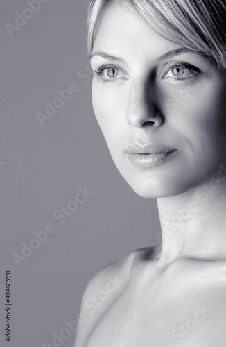 Photo: Woman staring blankly at a space. Woman staring blankly at a space.