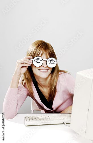 Photo: Businesswoman wearing spectacles. Businesswoman wearing spectacles.
