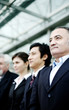 Corporate people standing in a row.