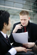 Businessmen having discussion.