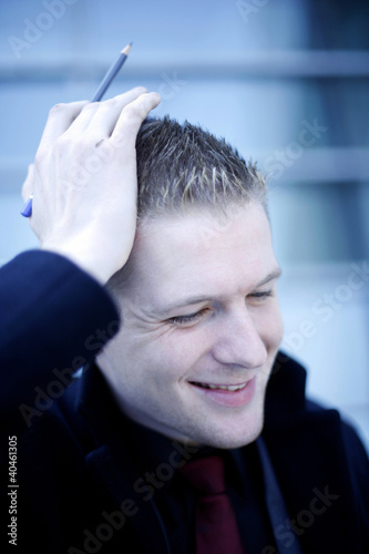 Photo: Businessman smiling. Businessman smiling.
