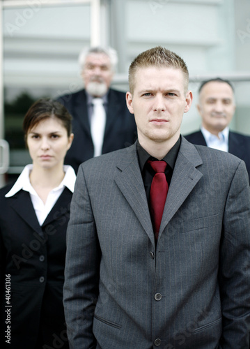 Photo: A group of corporate people. A group of corporate people.