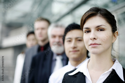 Photo: A group of corporate people. A group of corporate people.