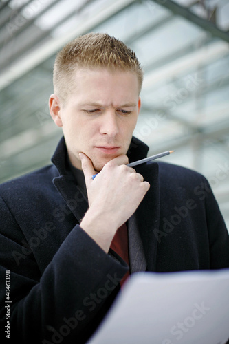 Photo: Businessman thinking. Businessman thinking.