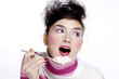 Foto: Woman eating ice-cream. Woman eating ice-cream.