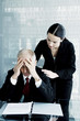 Woman comforting a stressed out businessman.