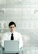 Photo: Businesswoman using laptop. Businesswoman using laptop.