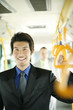 Photo: Businessman standing in the train. Businessman standing in the train.