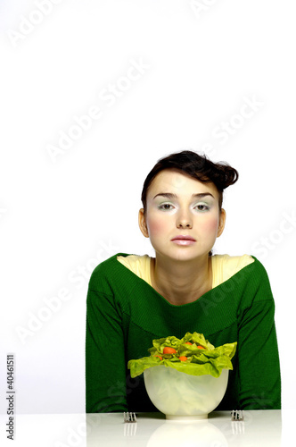 Photo: Woman preparing to eat a bowl of salad. Woman preparing to eat a bowl of salad.