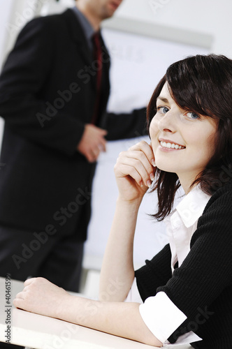 Foto: Businesswoman smiling at the camera. Businesswoman smiling at the camera.