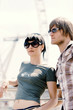 Couple wearing sunglasses.