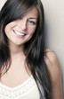 Woman flashing a smile at the camera.