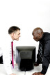 Two businessmen staring at each other angrily.