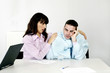 Businesswoman consoling her depressed colleague.