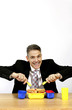 Businessman eating bread from his lunch box.