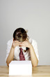 An overworked businesswoman.