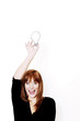 Businesswoman holding a light bulb.