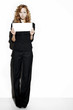 Businesswoman holding a blank piece paper.