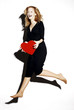 Businesswoman holding a red heart.