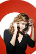 Businesswoman talking on the handphone.