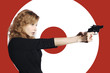 Businesswoman aiming a pistol.