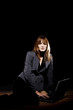 Photo: Businesswoman using laptop. Businesswoman using laptop.