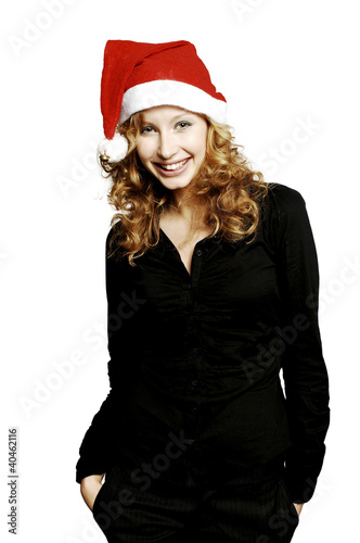Foto: Businesswoman wearing santa hat. Businesswoman wearing santa hat.
