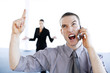 Businessman talking angrily on the mobile phone.