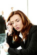 Businesswoman looking depressed.