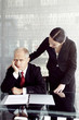 Businessman being consoled by his secretary.