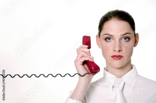 Photo: Businesswoman talking on the phone. Businesswoman talking on the phone.