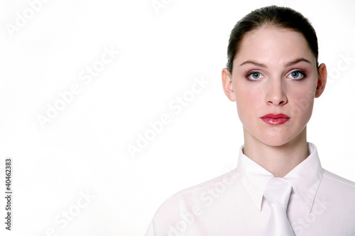 Photo: Businesswoman in classy white. Businesswoman in classy white.