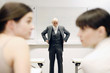 Photo: Old professor scolding his students for talking in the class. Old professor scolding his students for talking in the class.