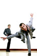Businessman being kicked out by his employer.