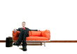 Foto: Businessman sitting on the couch with his legs crossed. Businessman sitting on the couch with his legs crossed.